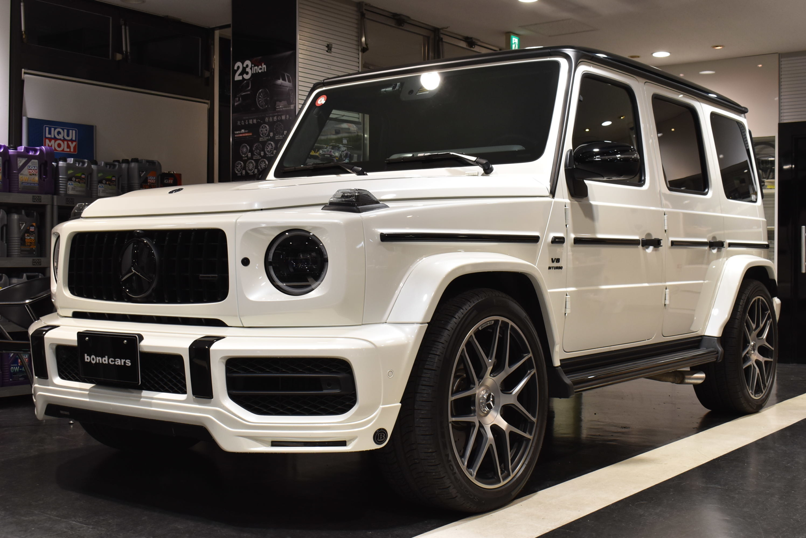メルセデスAMG G63 ストロンガーザンタイムエディション BRABUSフロントリップ 各部ブラックアウト Hellaブラックヘッドライト ナイトパッケージ仕様 レーダー&ドラレコ