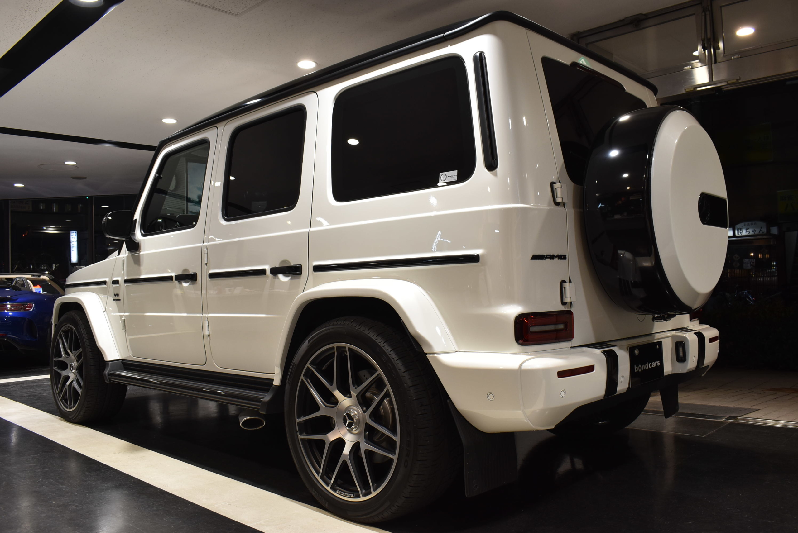 メルセデスAMG G63 ストロンガーザンタイムエディション BRABUSフロントリップ 各部ブラックアウト Hellaブラックヘッドライト ナイトパッケージ仕様 レーダー&ドラレコ
