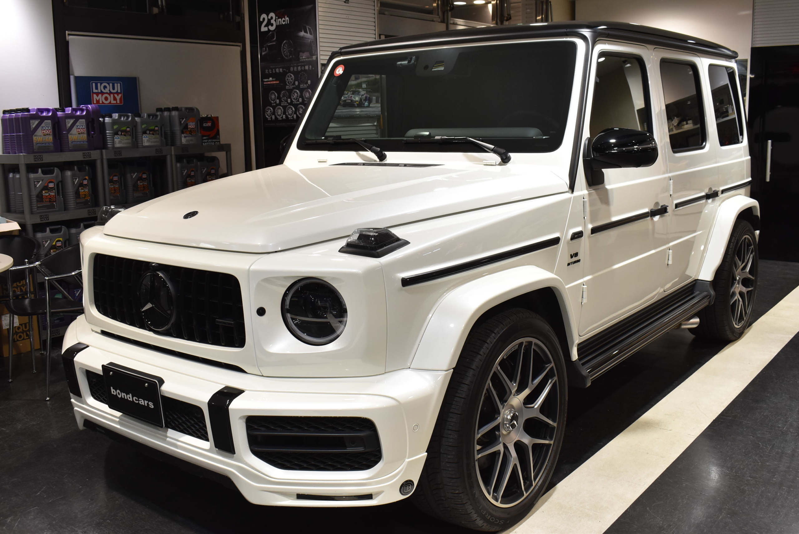 メルセデスAMG G63 ストロンガーザンタイムエディション BRABUSフロントリップ 各部ブラックアウト Hellaブラックヘッドライト ナイトパッケージ仕様 レーダー&ドラレコ
